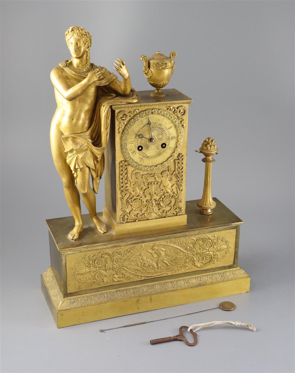 A 19th century French Empire style ormolu mantel clock, height 19.25in.